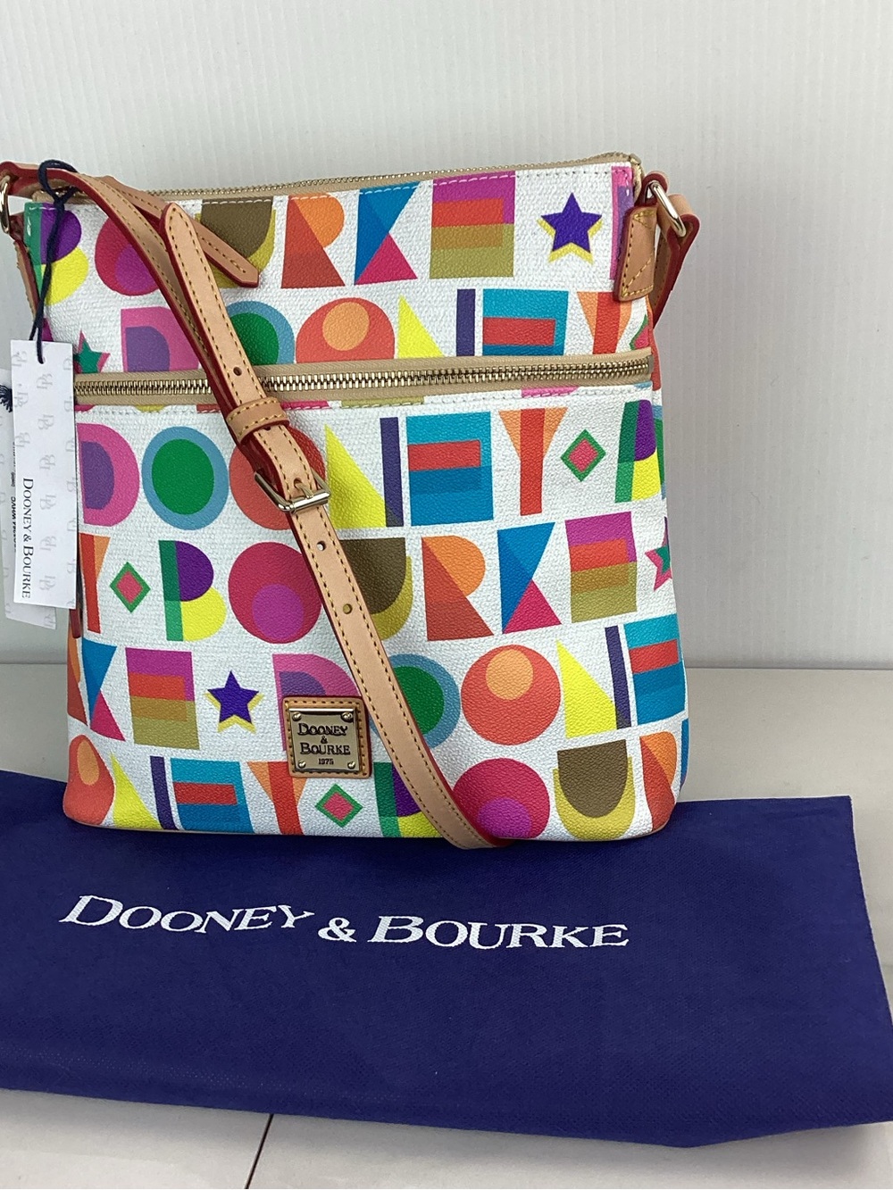 Dooney And Bourk Art Deco Coated Logo Leather  Editor Crossbody Bag Multicolor